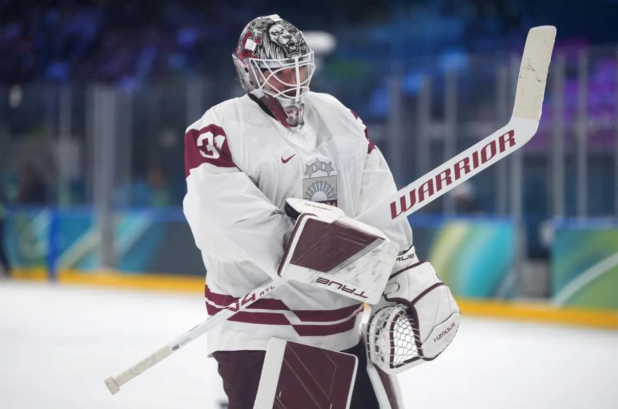 Arturs Silovs of Latvia during the match during a Group C men's ice hockey game during the Milano Cortina 2026 Olympic Winter Games at Milano Rho Ice Hockey Arena.