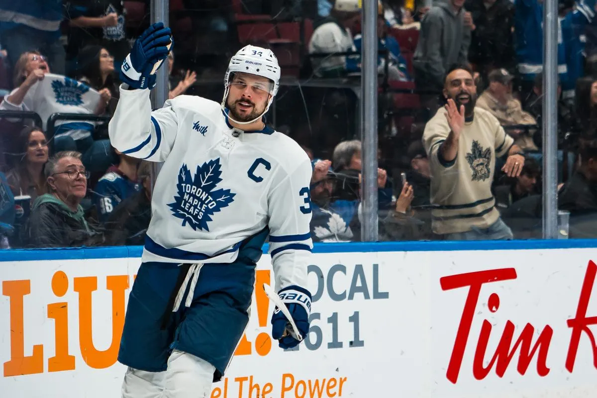 Toronto Maple Leafs forward Auston Matthews (34) celebrates his game winning shootout goal against the Vancouver Canucks at Rogers Arena.