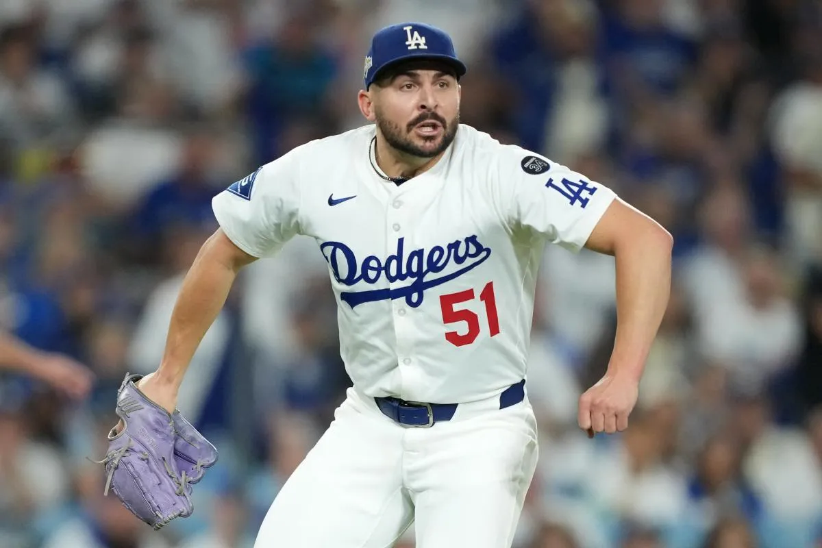 Los Angeles Dodgers pitcher Alex Vesia (51) reacts in the seventh inning against the Milwaukee Brewers during game four of the NLCS round for the 2025 MLB playoffs at Dodger Stadium.