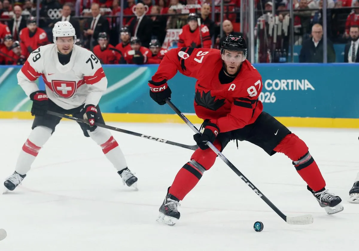 Connor McDavid of Canada in action against Switzerland in men's ice hockey group A play during the Milano Cortina 2026 Olympic Winter Games at Milano Santagiulia Ice Hockey Arena.