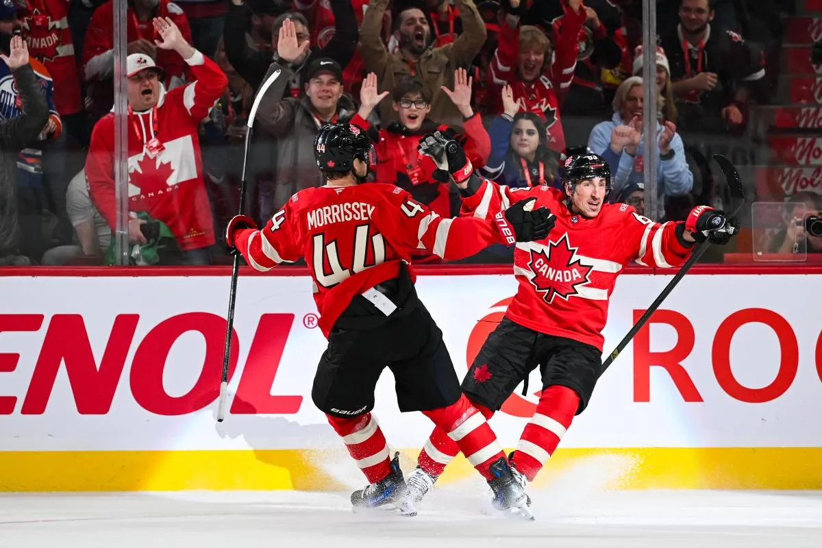 [Imagn Images direct customers only] Team Canada forward Brad Marchand (63) celebrates with defenseman Josh Morrissey (44) his goal against Team Sweden in the first period during a 4 Nations Face-Off ice hockey game at Bell Centre.
