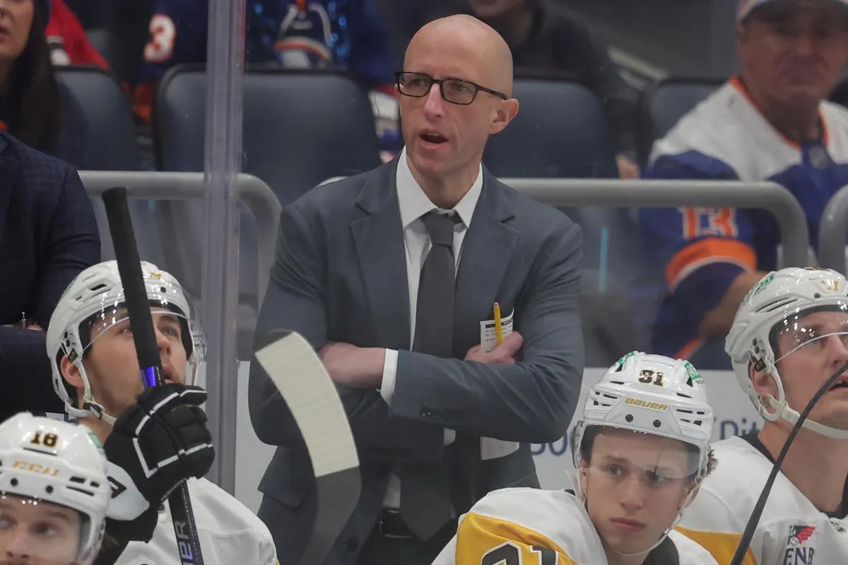 Pittsburgh Penguins head coach Dan Muse coaches against the New York Islanders during the first period at UBS Arena.