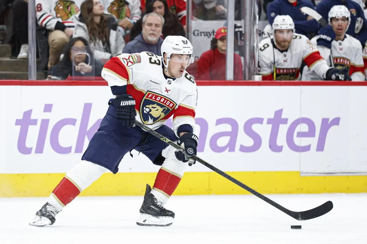 Florida Panthers left wing Brad Marchand (63) looks to pass the puck against the Chicago Blackhawks during the second period at United Center.