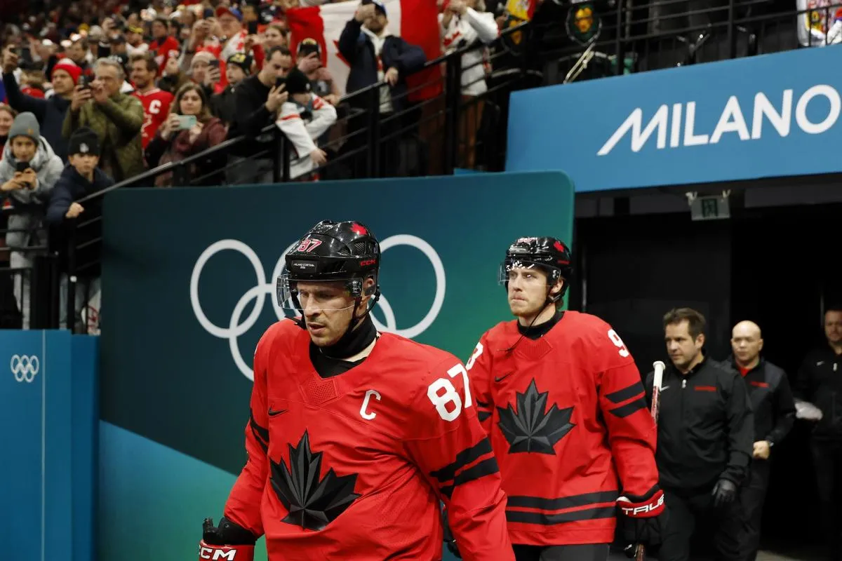 Sidney Crosby of Canada walks out to the ice before a men's ice hockey quarterfinal during the Milano Cortina 2026 Olympic Winter Games at Milano Santagiulia Ice Hockey Arena