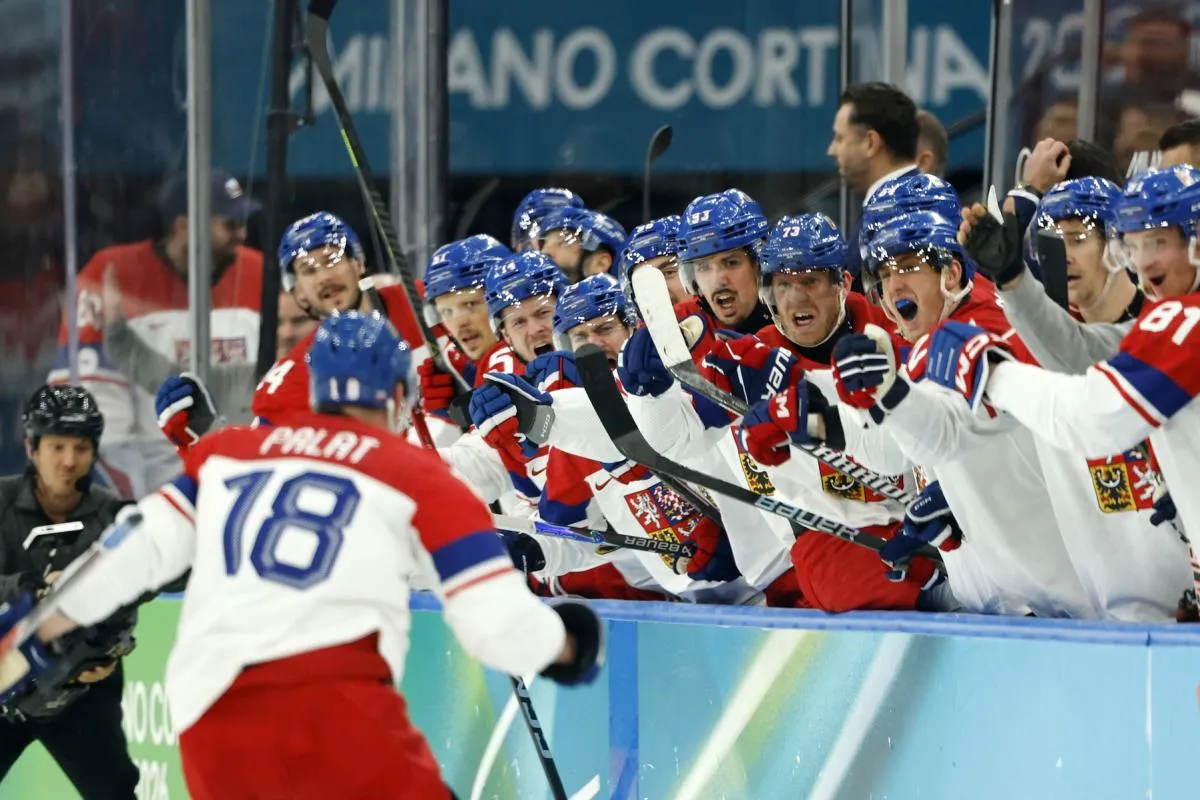 Czechia celebrate after Ondrej Palat scored their third goal against Canada in a men's ice hockey quarterfinal during the Milano Cortina 2026 Olympic Winter Games at Milano Santagiulia Ice Hockey Arena.