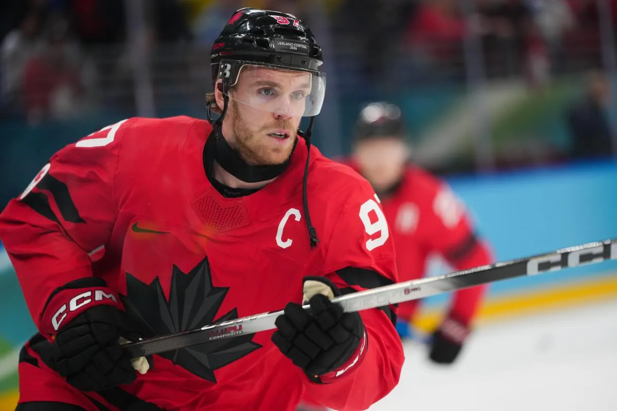 Connor McDavid (97) of Canada warms up before the game against Finland in a men's ice hockey semifinal during the Milano Cortina 2026 Olympic Winter Games at Milano Santagiulia Ice Hockey Arena.