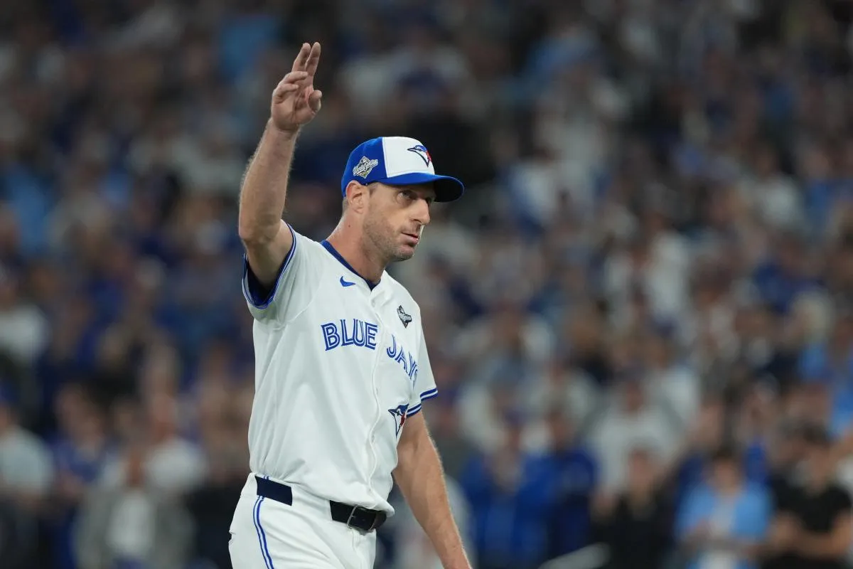 Toronto Blue Jays pitcher Max Scherzer (31) reacts after being relieved against the Los Angeles Dodgers in the fifth inning for game seven of the 2025 MLB World Series at Rogers Centre.