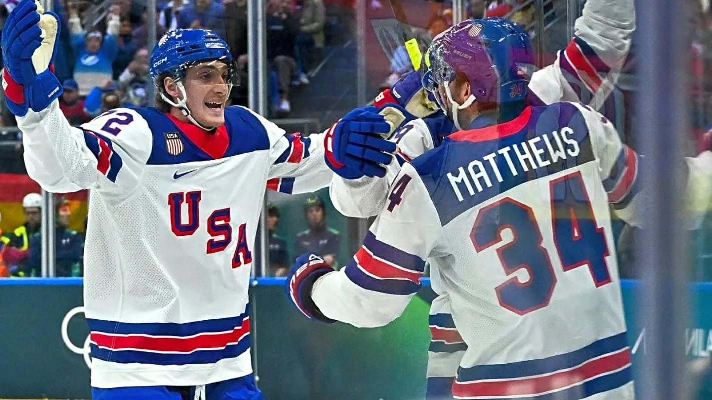 Auston Matthews of United States celebrates scoring their second goal with teammates against Germany in men's ice hockey group A play during the Milano Cortina 2026 Olympic Winter Games at Milano Santagiulia Ice Hockey Arena. Marton Monus/Reuters via Imagn Images