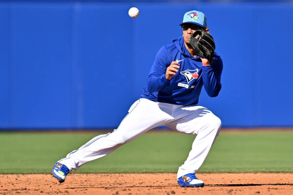 Toronto Blue Jays infielder Andres Gimenez (0) fields a ground ball during spring training at Bobby Mattick Training Center at Englebert Complex.