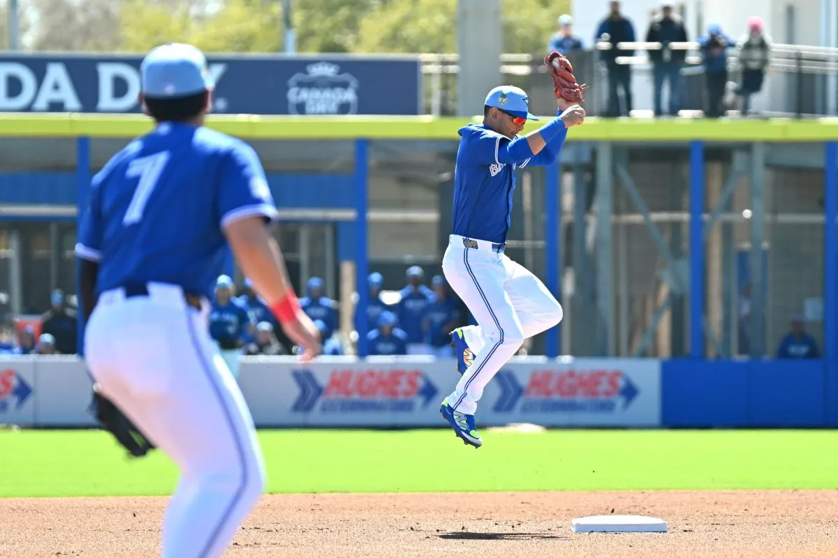 Toronto Blue Jays shortstop Andres Gimenez (0) makes a force out at second in the first inning against the New York Mets at TD Ballpark.