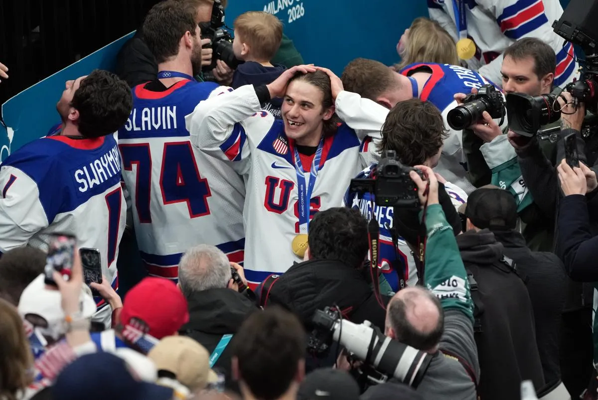 Jack Hughes of the United States celebrates after winning the men's ice hockey gold medal game during the Milano Cortina 2026 Olympic Winter Games at Milano Santagiulia Ice Hockey Arena