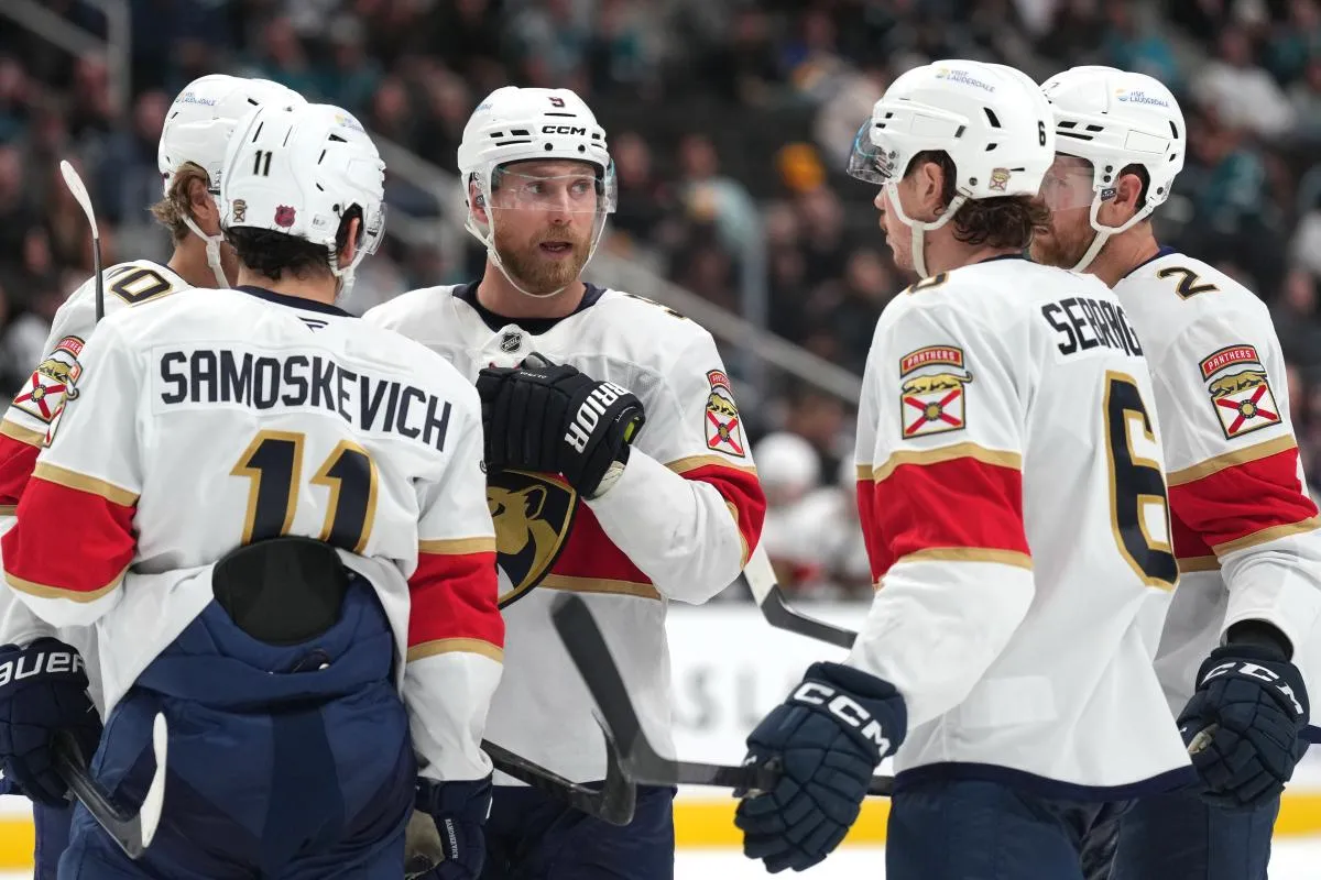Florida Panthers center Sam Bennett (center) talks with left wing A.J. Greer (10) and right wing Mackie Samoskevich (11) and defensemen Donovan Sebrango (6) and Jeff Petry (2) at SAP Center at San Jose