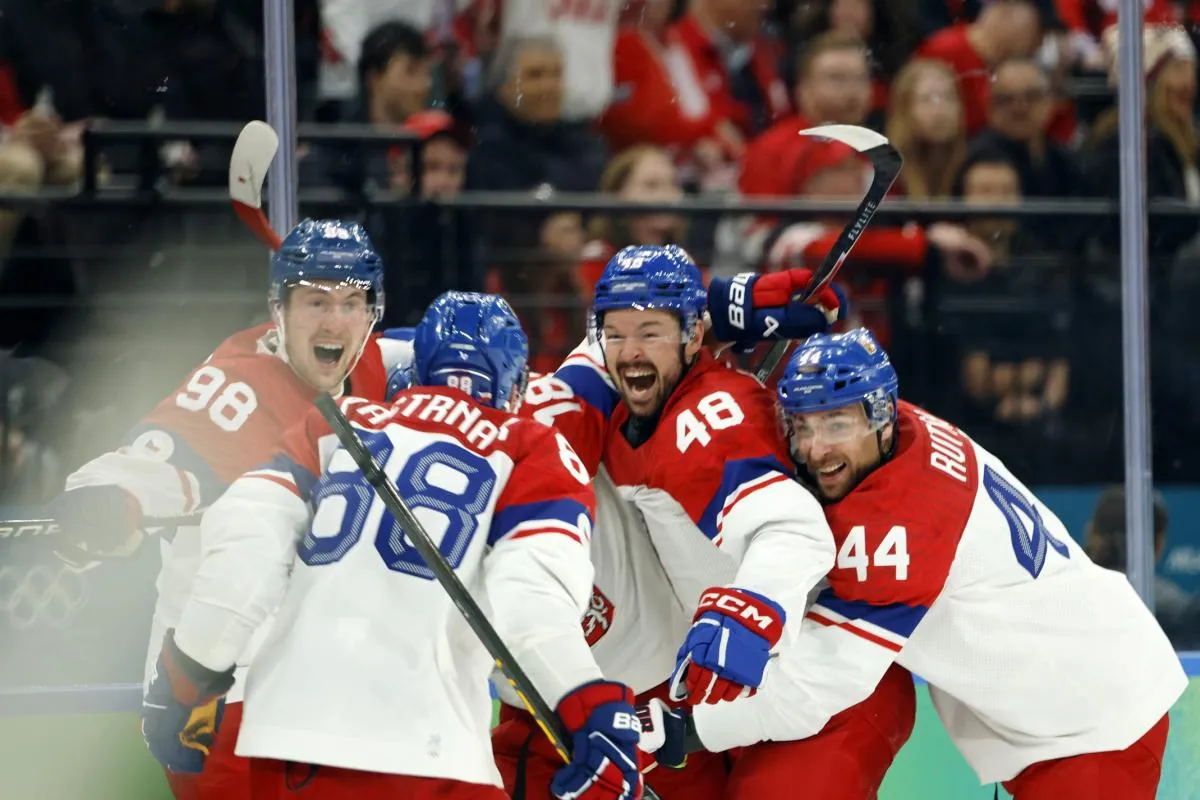 Czechia celebrate after Ondrej Palat scored their third goal against Canada in a men's ice hockey quarterfinal during the Milano Cortina 2026 Olympic Winter Games at Milano Santagiulia Ice Hockey Arena.