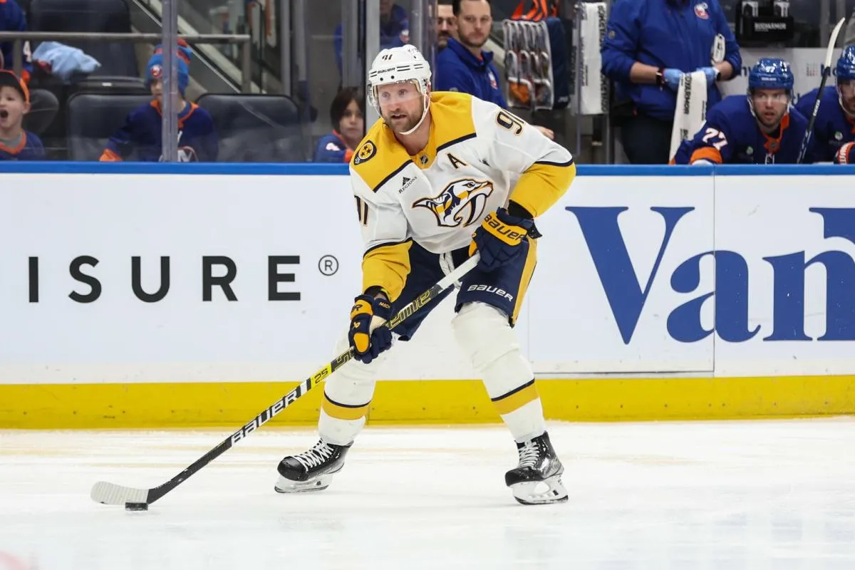 Nashville Predators center Steven Stamkos (91) controls the puck in the first period against the New York Islanders at UBS Arena.