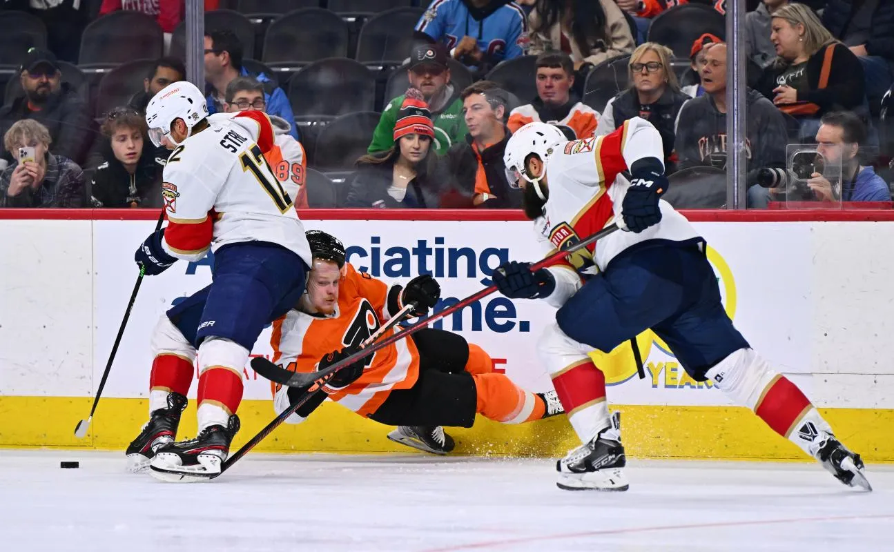 Philadelphia Flyers right wing Owen Tippett (74) collides with Florida Panthers center Eric Staal (12) in the third period at Wells Fargo Center