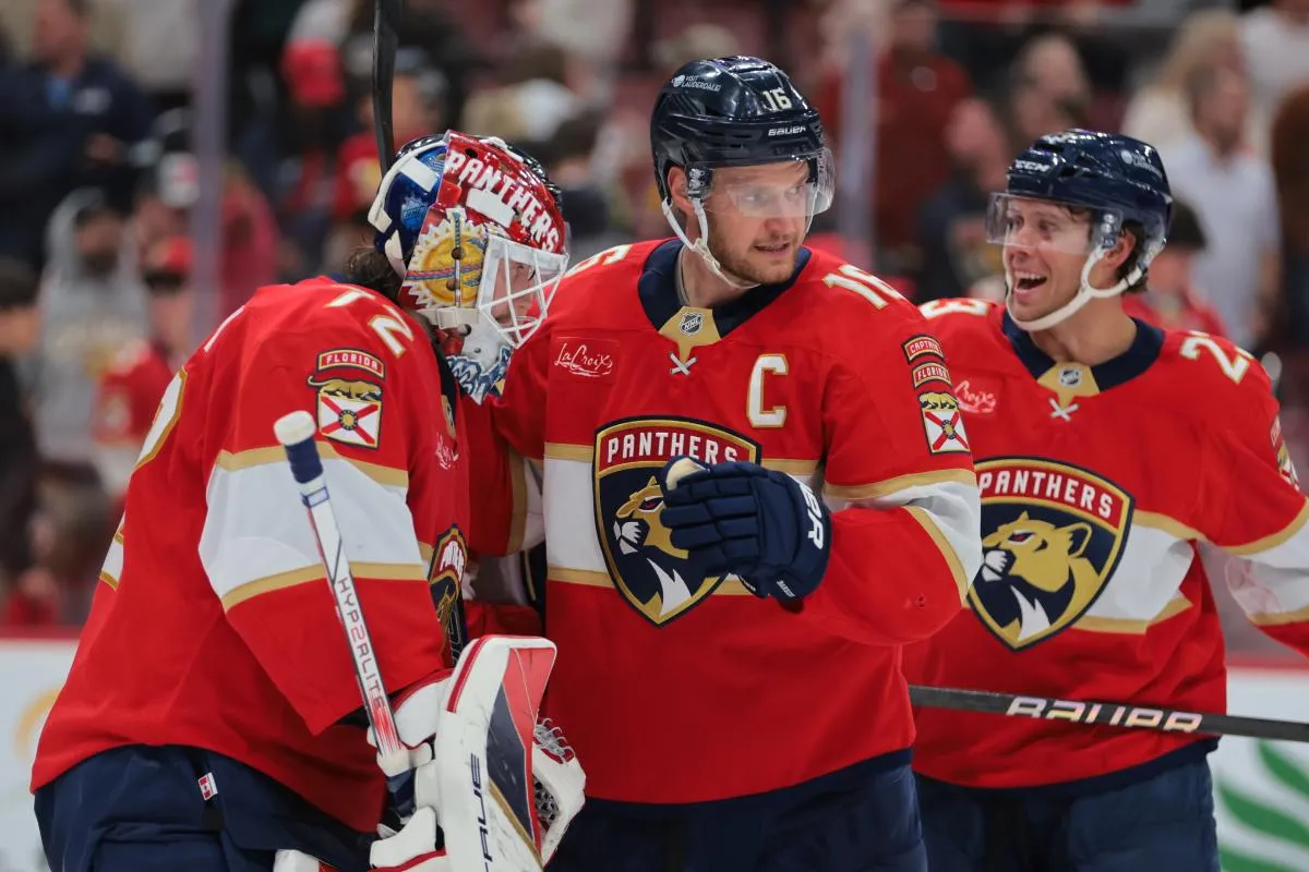 Florida Panthers goaltender Sergei Bobrovsky (72) celebrates with center Aleksander Barkov (16) after the game against the Edmonton Oilers at Amerant Bank Arena.