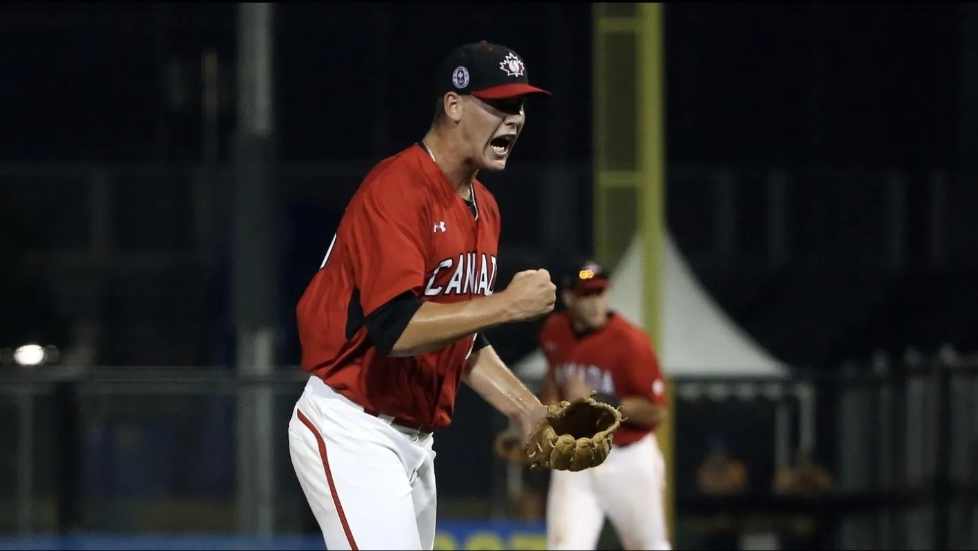Canada pitcher Brock Dykxhoorn (55) celebrates the victory after the final out in the ninth inning against Puerto Rico during the 2015 Pan Am Games at Ajax Pan Am Ballpark. Canada beat Puerto Rico 7-1