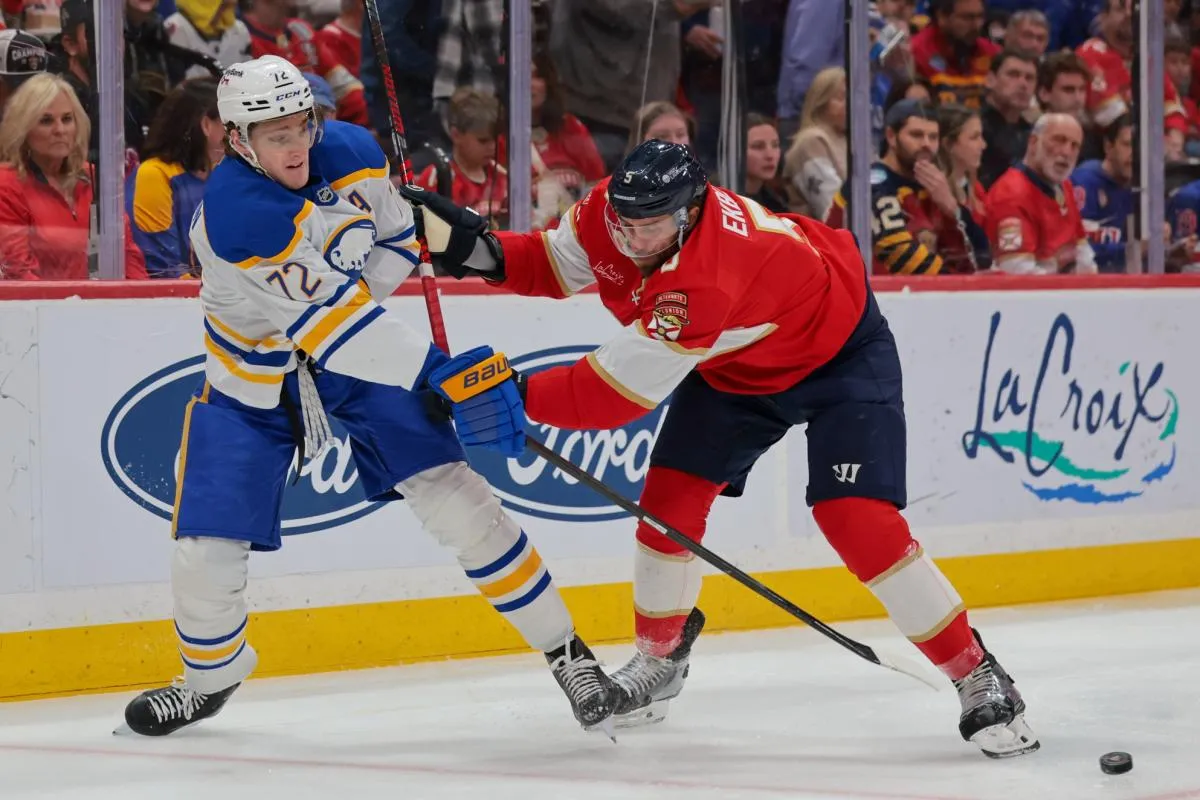 Buffalo Sabres center Tage Thompson (72) shoots the puck as Florida Panthers defenseman Aaron Ekblad (5) defends during the first period at Amerant Bank Arena.