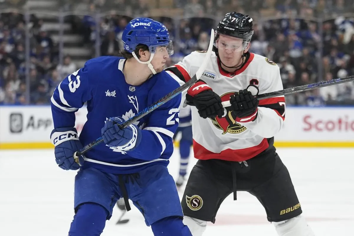 Ottawa Senators forward Brady Tkachuk (7) goes to check Toronto Maple Leafs forward Matthew Knies (23) during the third period at Scotiabank Arena.