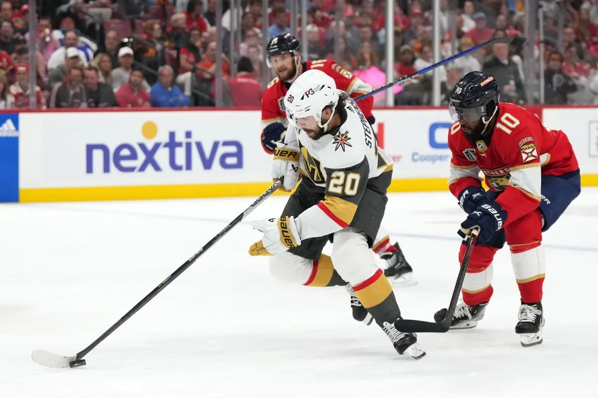 Vegas Golden Knights center Chandler Stephenson (20) controls the puck in front of Florida Panthers left wing Anthony Duclair (10) during the third period in game three of the 2023 Stanley Cup Final at FLA Live Arena.