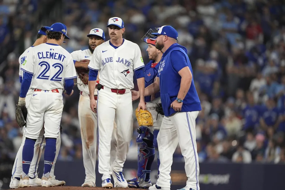 Toronto Blue Jays pitcher Shane Bieber (57) is relieved in the fourth inning against the Seattle Mariners during game seven of the ALCS round for the 2025 MLB playoffs at Rogers Centre.