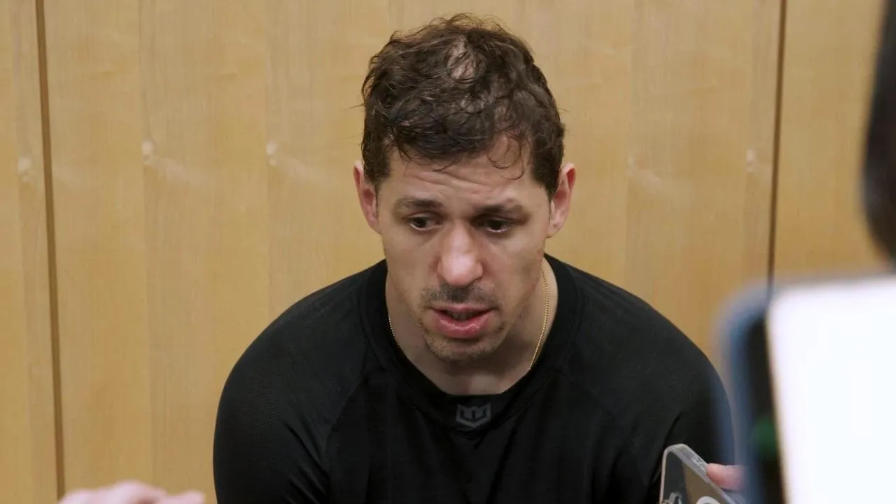 Penguins forward Evgeni Malkin speaking to the media after a game in the NHL.