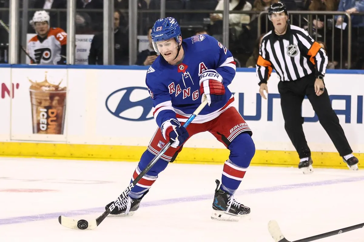 New York Rangers defenseman Adam Fox (23) looks to make a pass in the third period against the Philadelphia Flyers in the third period at Madison Square Garden.