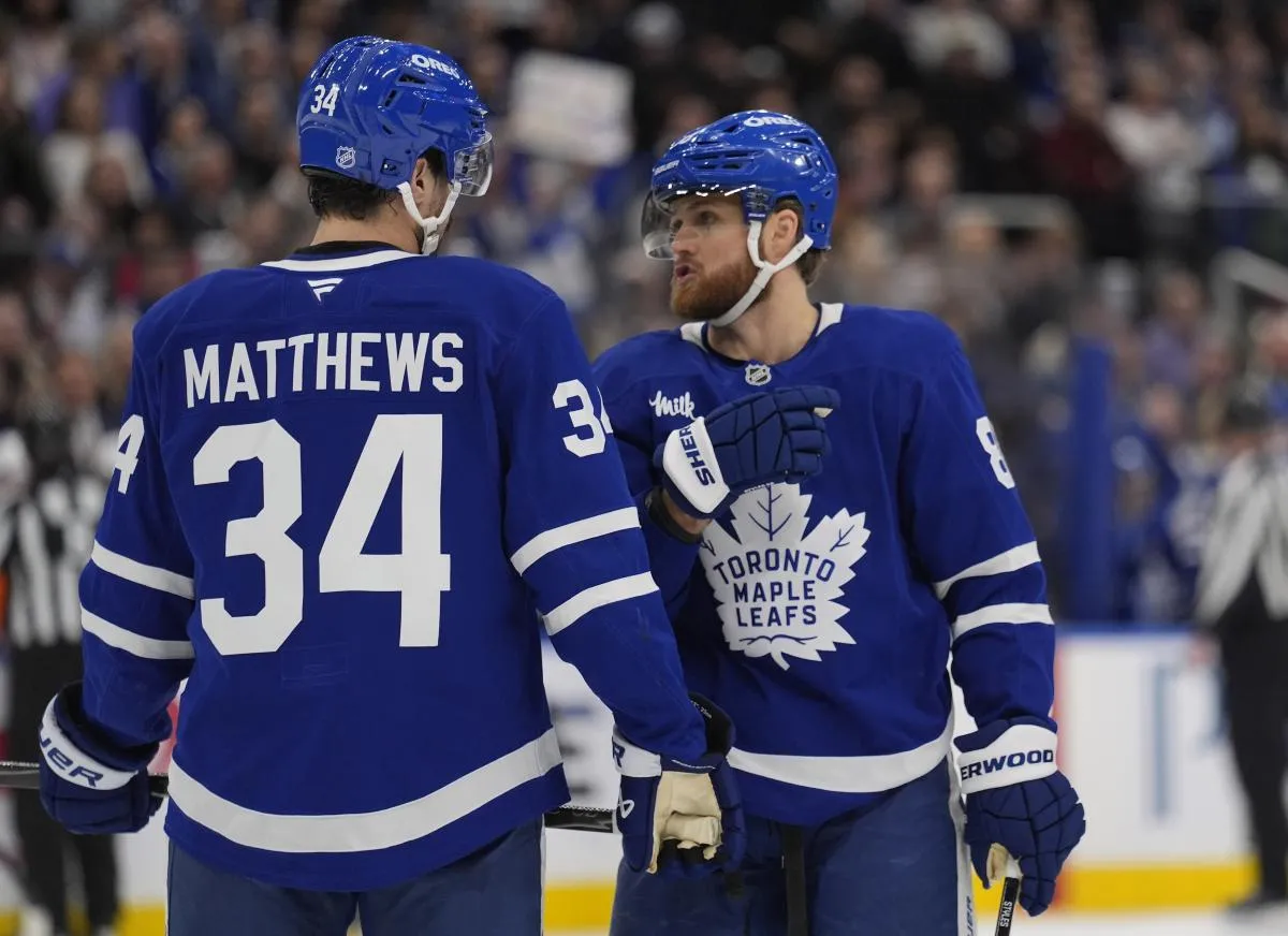 Toronto Maple Leafs forward William Nylander (88) and forward Auston Matthews (34) discuss a play against the Tampa Bay Lightning during the first period at Scotiabank Arena.