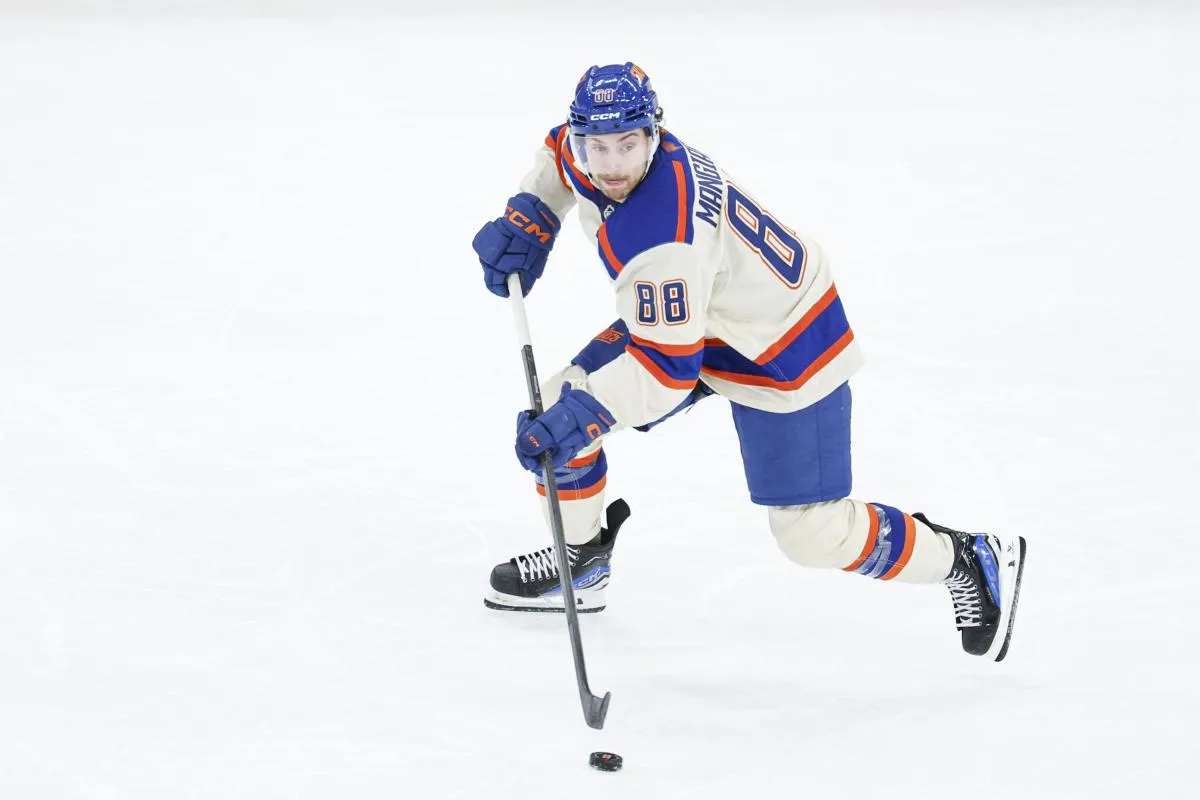 Edmonton Oilers left wing Andrew Mangiapane (88) looks to pass the puck against the Chicago Blackhawks during the third period at United Center