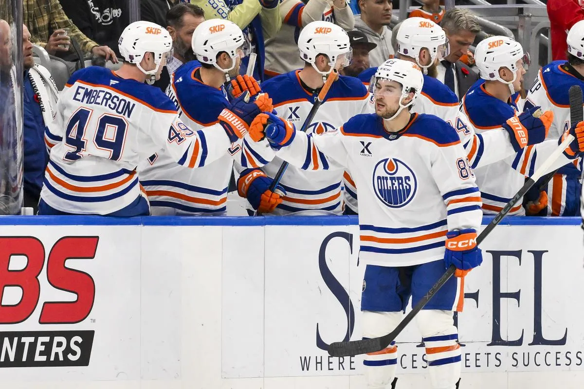 Edmonton Oilers left wing Andrew Mangiapane (88) is congratulated by teammates after scoring against the St. Louis Blues during the second period at Enterprise Center.