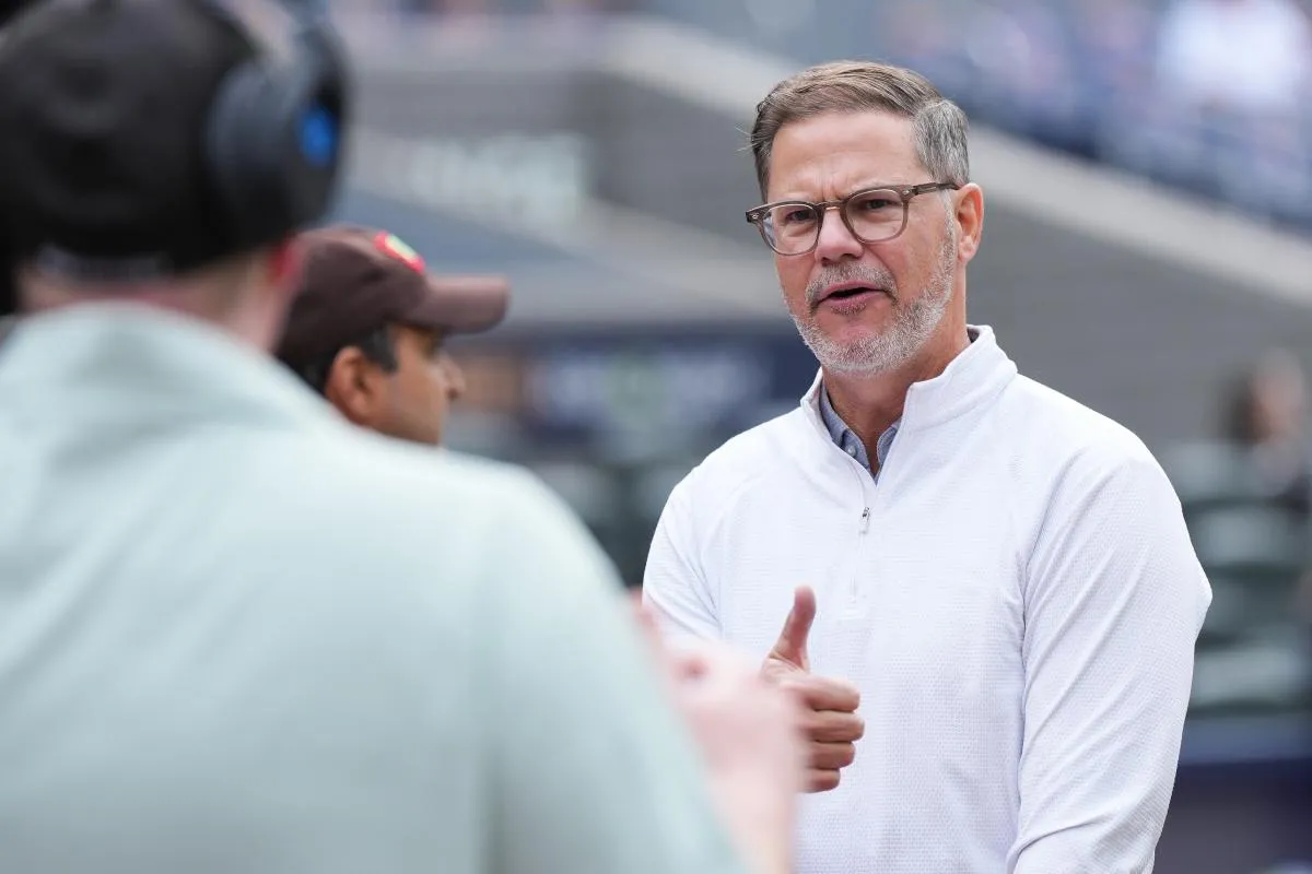 Toronto Blue Jays general manager Ross Atkins talks with the media during batting practice between the Toronto Blue Jays and Seattle Mariners before game two of the ALCS round for the 2025 MLB playoffs at Rogers Centre.