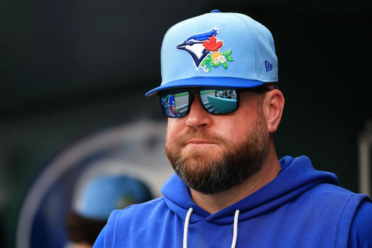 Toronto Blue Jays manager John Schneider (14) looks on during the third inning against the Boston Red Sox at JetBlue Park at Fenway South.