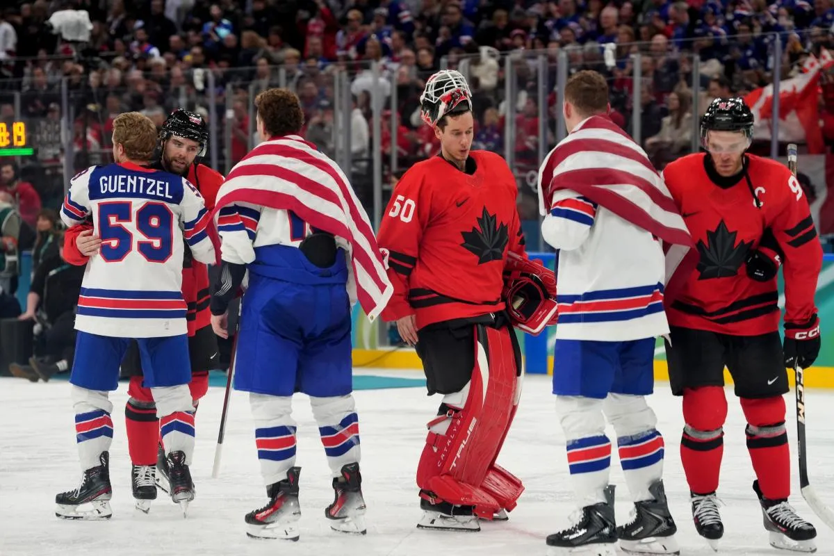 Jordan Binnington (50) of Canada shakes hands with Untied States players after the men's ice hockey gold medal game during the Milano Cortina 2026 Olympic Winter Games at Milano Santagiulia Ice Hockey Arena.