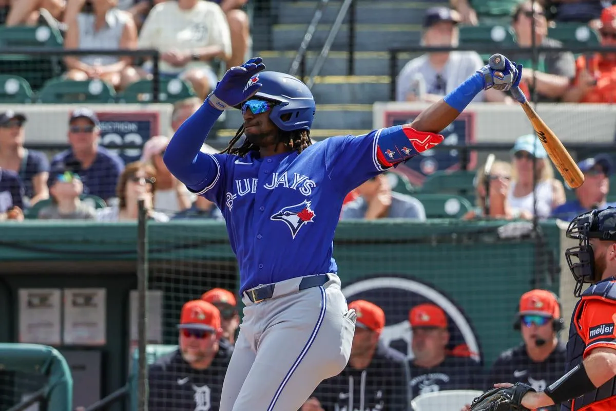 Toronto Blue Jays third baseman Charles McAdoo (26) hits during the third inning against the Detroit Tigers at Publix Field at Joker Marchant Stadium.