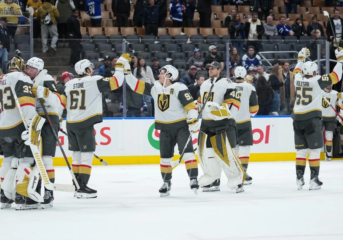 Vegas Golden Knights right wing Mitch Marner (93) celebrates the win against the Toronto Maple Leafs with right wing Mark Stone (61) at the end of the third period at Scotiabank Arena.