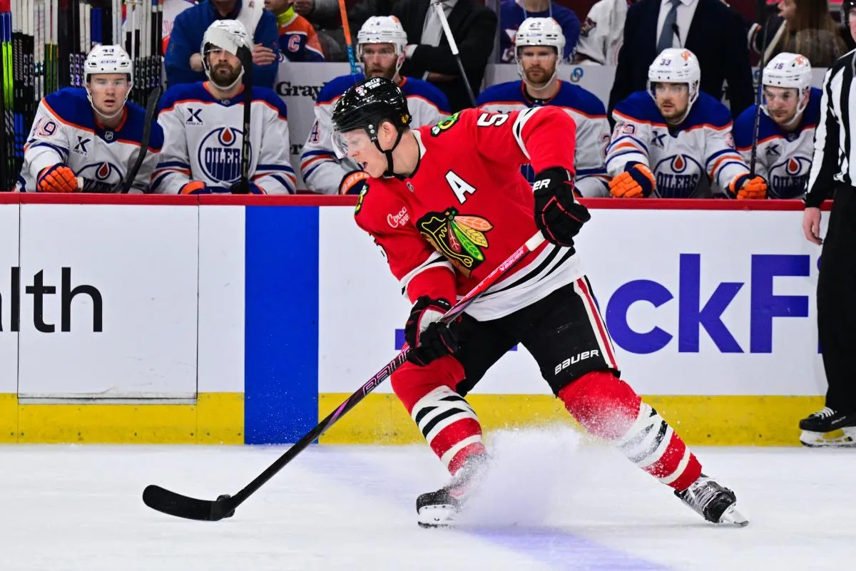 Chicago Blackhawks defenseman Connor Murphy (5) skates with the puck against the Edmonton Oilers during the first period at the United Center.