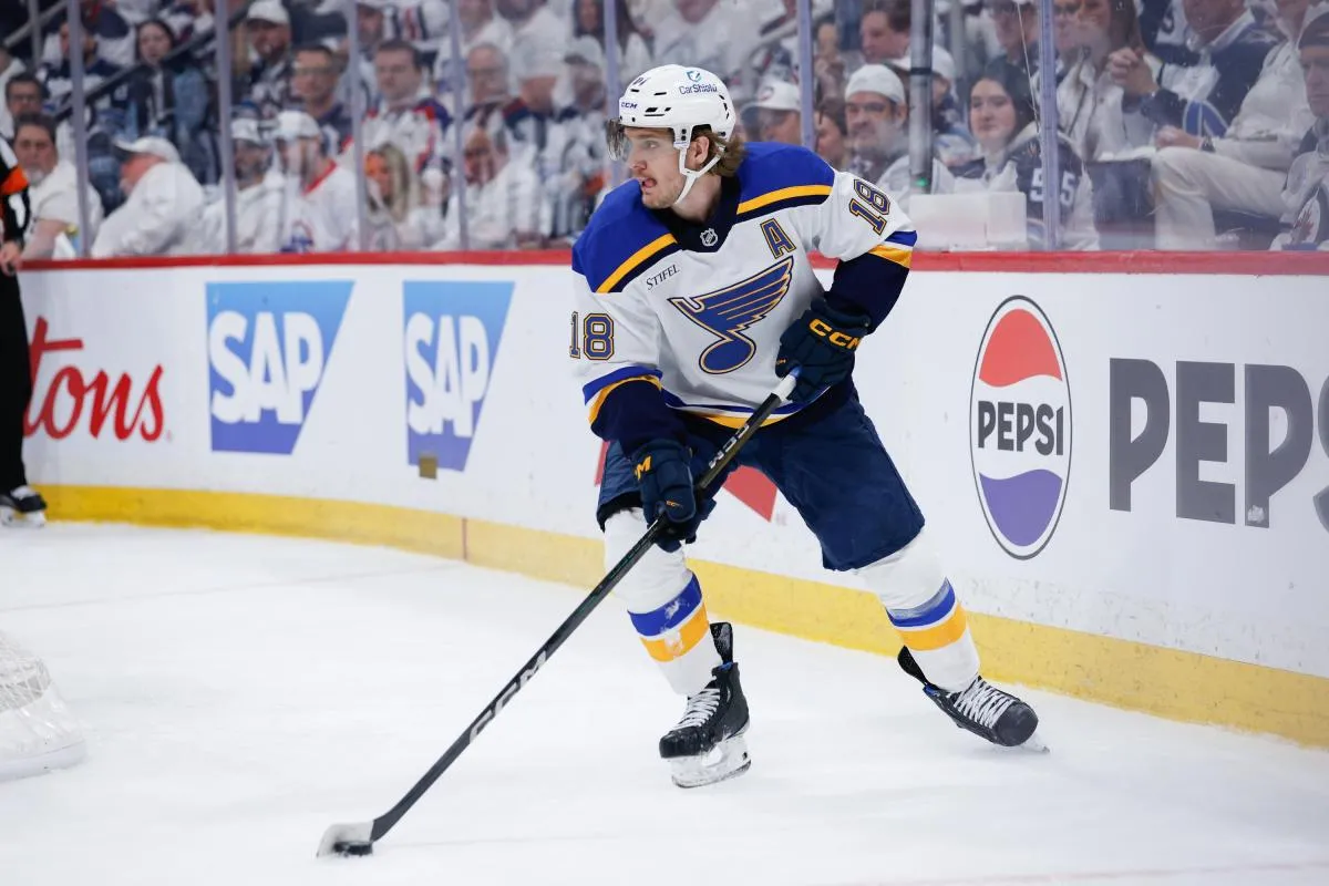 St. Louis Blues forward Robert Thomas (18) looks to make a pass against the Winnipeg Jets during the first period in game one of the first round of the 2025 Stanley Cup Playoffs at Canada Life Centre.