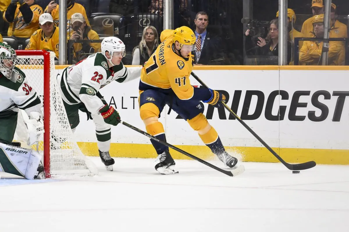 Nashville Predators right wing Michael McCarron (47) skates behind the net against the Minnesota Wild during the third period at Bridgestone Arena.