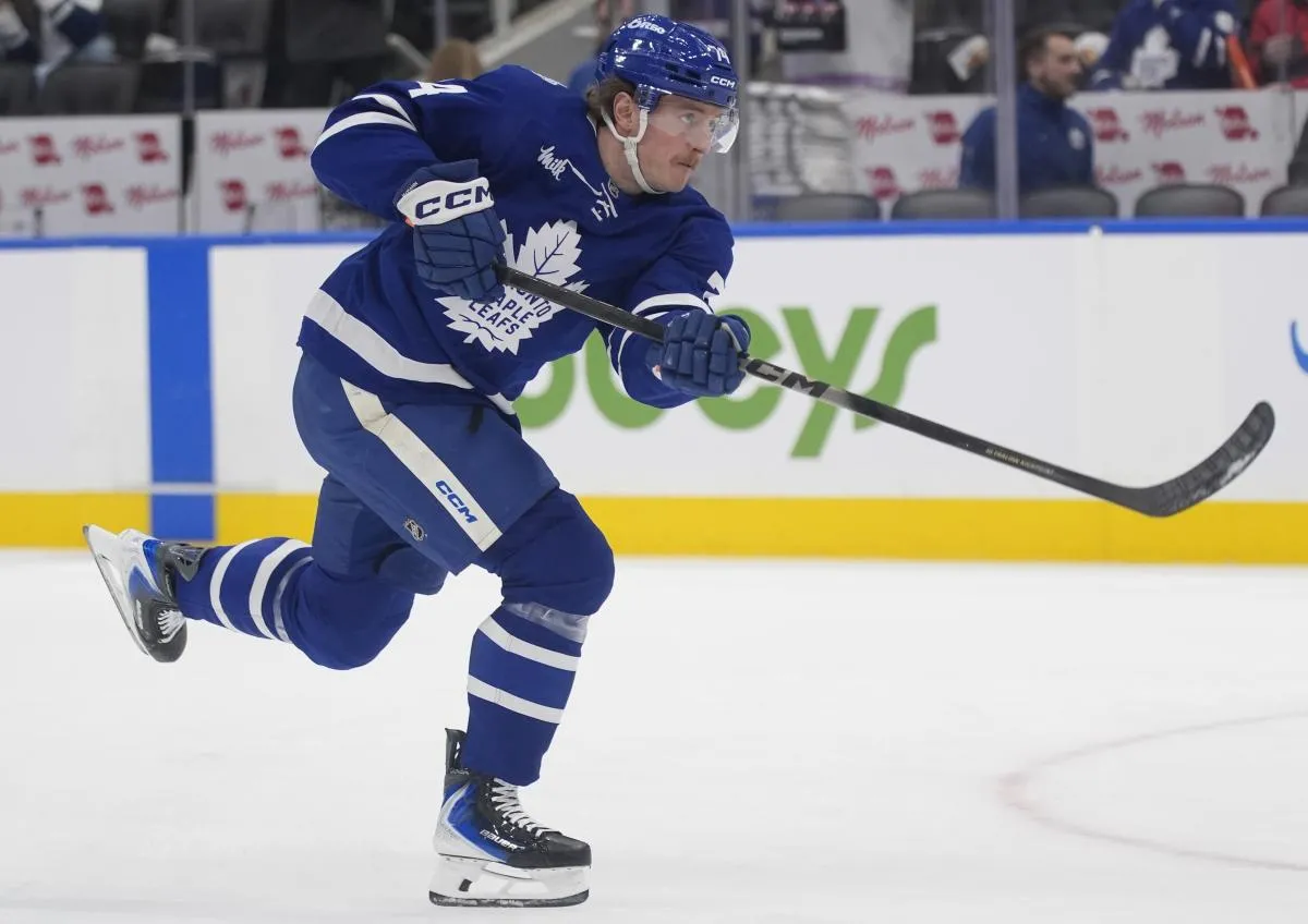 Toronto Maple Leafs forward Bobby McMann (74) shoots the puck during warm up before a game against the Buffalo Sabres at Scotiabank Arena
