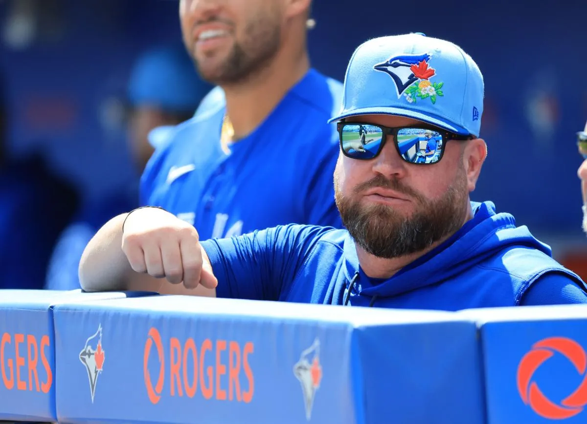 Toronto Blue Jays manager John Schneider (14) looks on against Team Canada at TD Ballpark.
