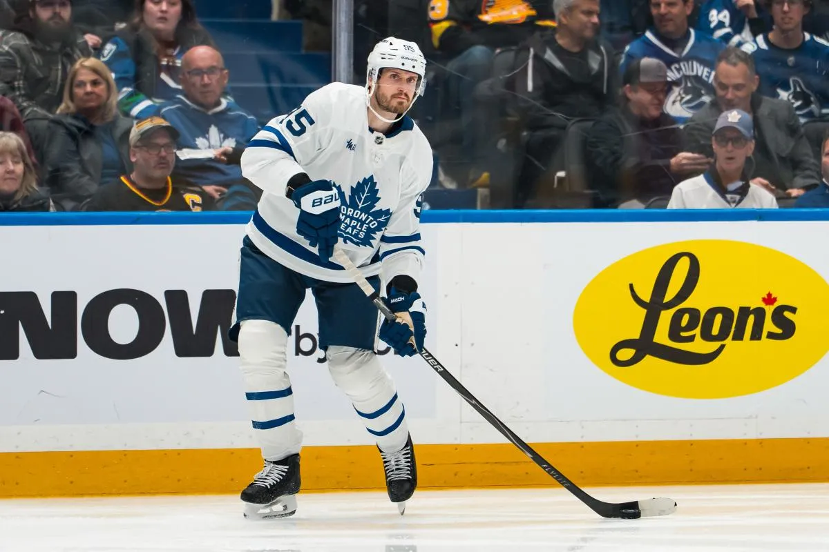 Toronto Maple Leafs defenseman Oliver Ekman-Larsson (95) handles the puck against the Vancouver Canucks in the third period at Rogers Arena.