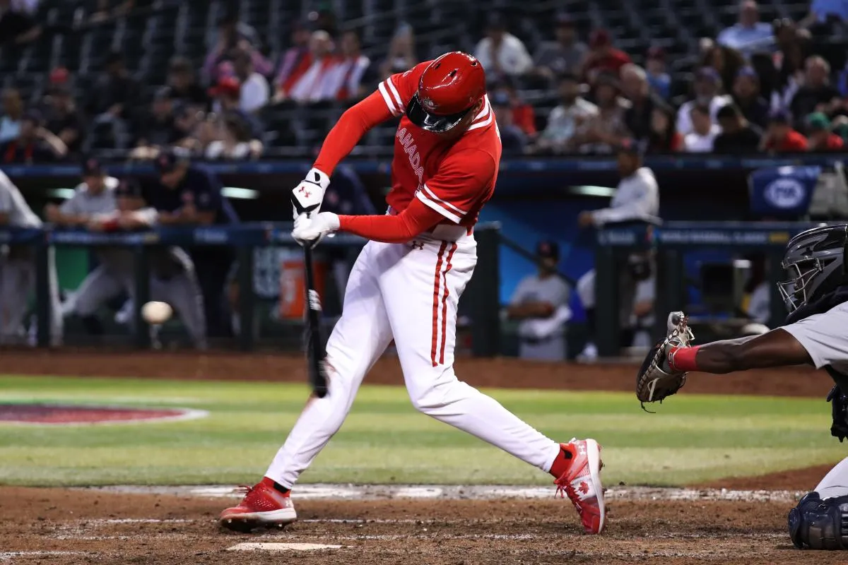 Team Canada infielder Freddie Freeman (5) at bat against Team Great Britain at Chase Field.