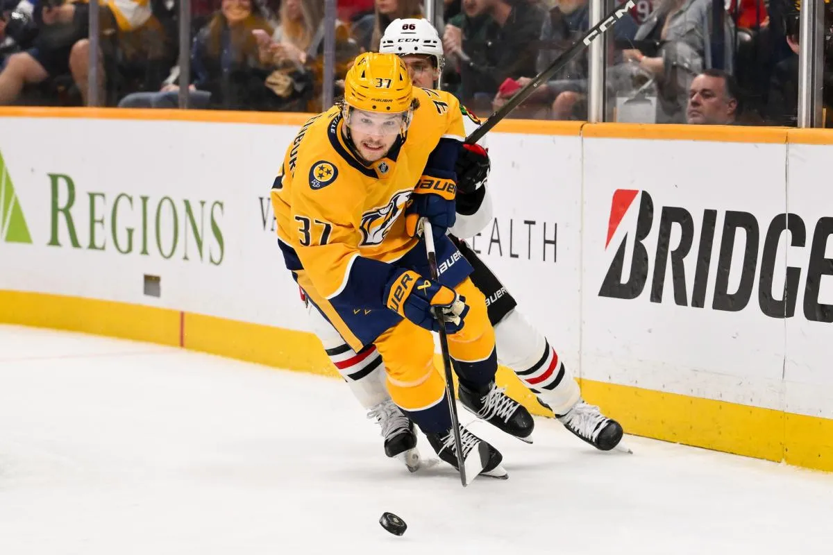 Nashville Predators defenseman Nick Blankenburg (37) skates with the puck against the Chicago Blackhawks during the second period at Bridgestone Arena.
