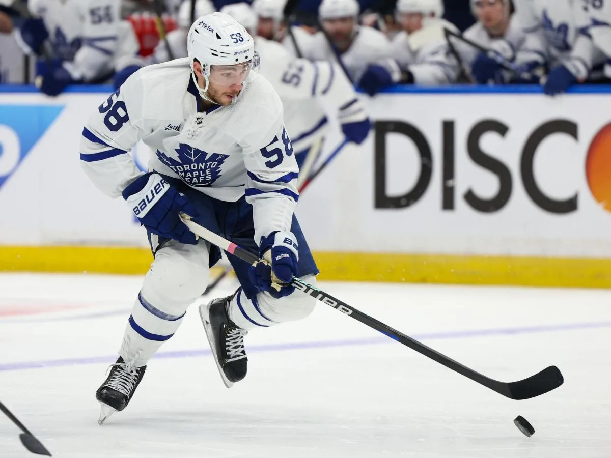 Toronto Maple Leafs left wing Michael Bunting (58) controls the puck against the Tampa Bay Lightning in the second period during game six of the first round of the 2023 Stanley Cup Playoffs at Amalie Arena