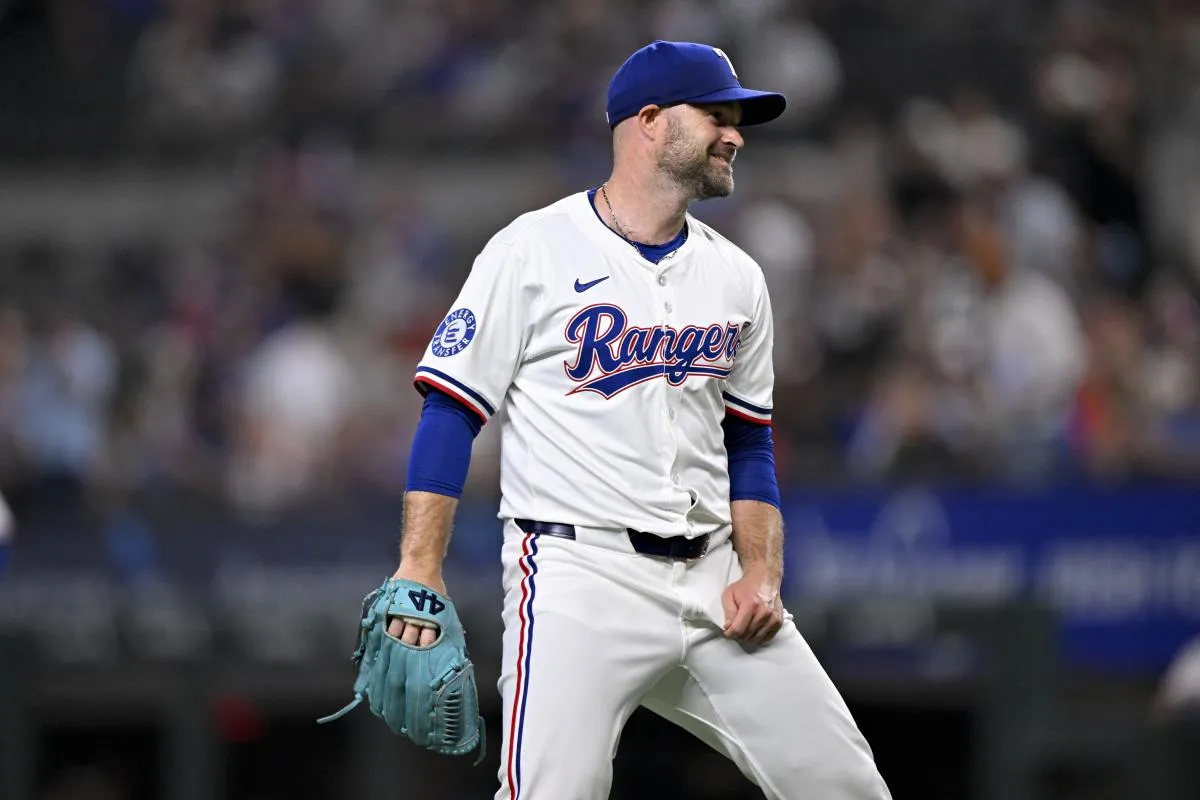 Texas Rangers relief pitcher Danny Coulombe (54) celebrates after he pitches against the New York Yankees during the tenth inning at Globe Life Field.