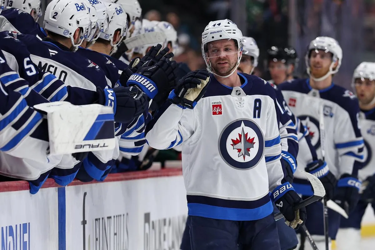 Winnipeg Jets defenseman Josh Morrissey (44) celebrates his goal against the Minnesota Wild during the first period at Grand Casino Arena.