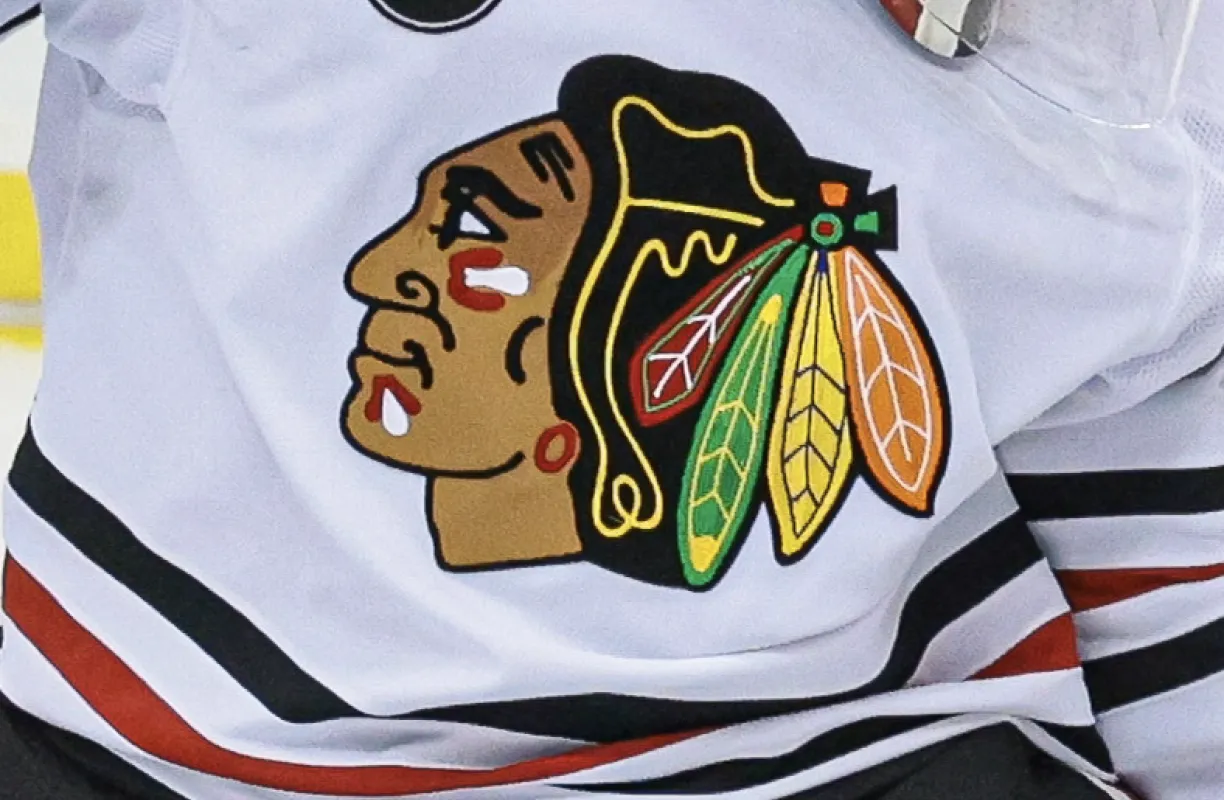 Chicago Blackhawks goaltender Kevin Lankinen (32) makes a save during the second period against the New Jersey Devils at Prudential Center.