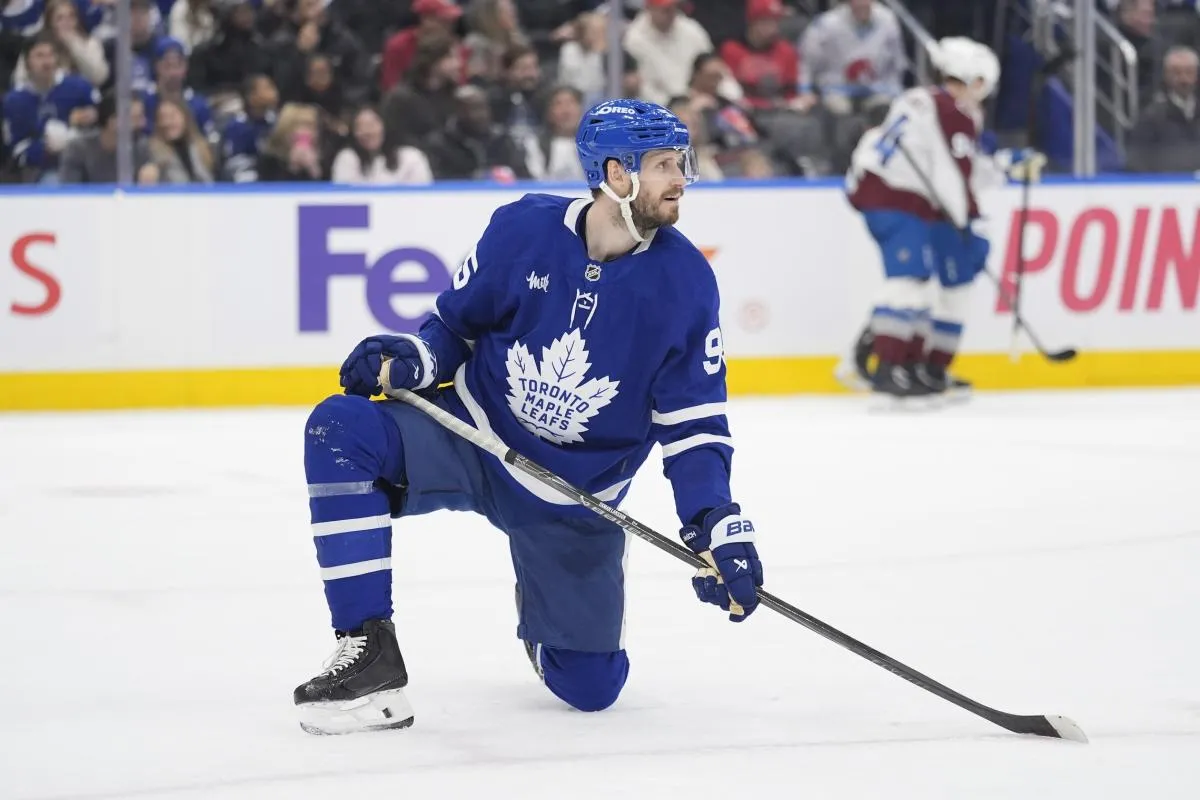 Toronto Maple Leafs defenseman Oliver Ekman-Larsson (95) kneels on the ice after a goal by Colorado Avalanche forward Jack Drury (not pictured) during the second period at Scotiabank Arena.