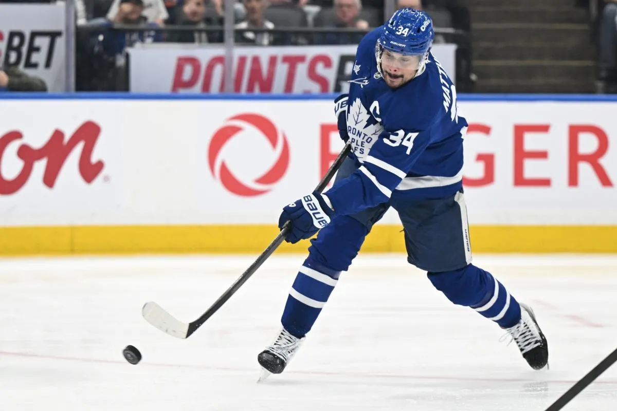 Toronto Maple Leafs forward Auston Matthews (34) shoots the puck against the Tampa Bay Lightning in the third period at Scotiabank Arena.