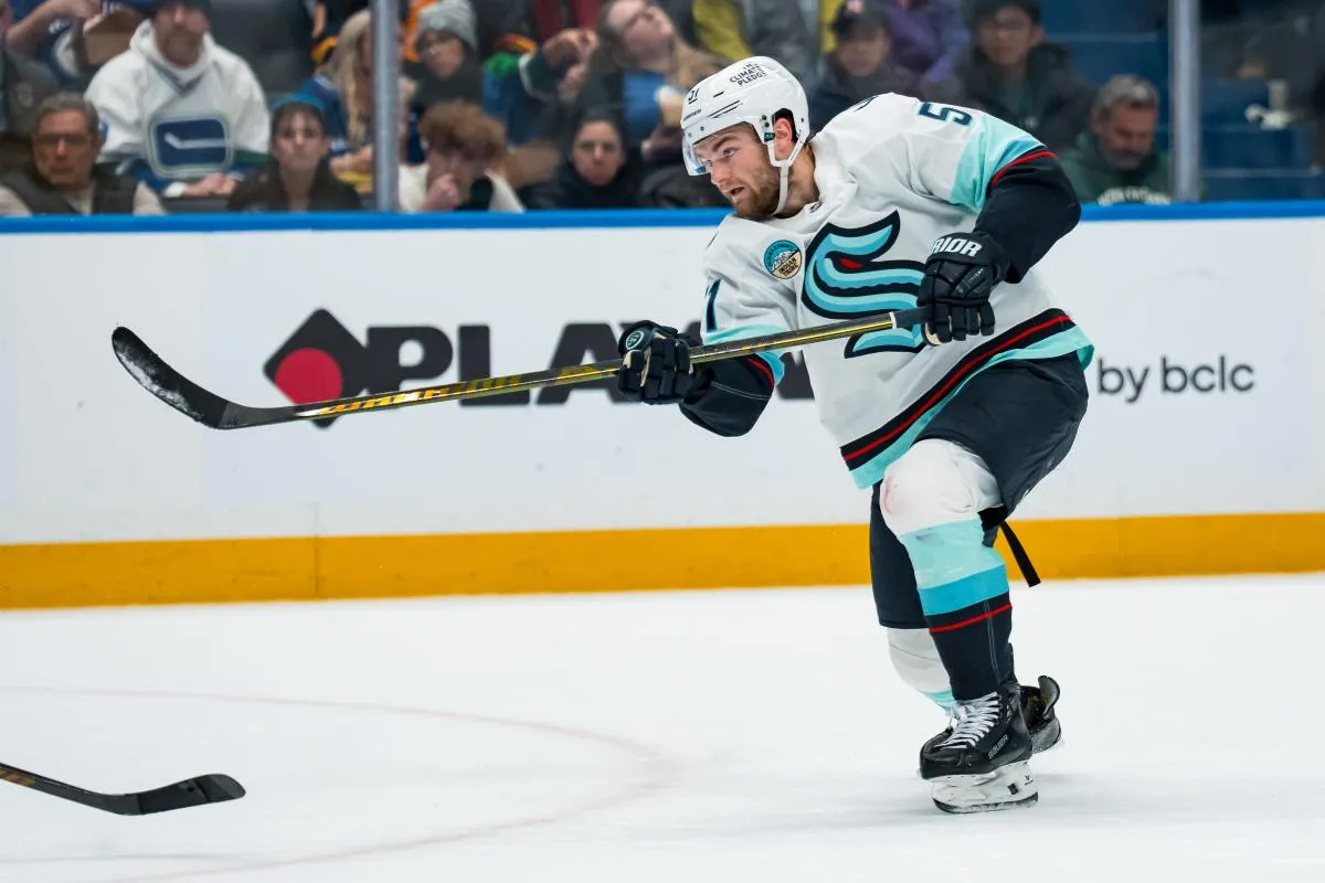 Seattle Kraken forward Shane Wright (51) shoots against the Vancouver Canucks in the first period at Rogers Arena.
